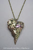 Harlequin&Lionhead handmade feather wings heart statement pendant necklace in brass Harlequin&Lionhead handmade feather wings heart statement pendant necklace in brass