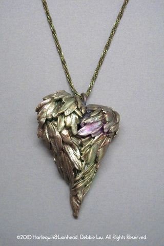 Harlequin&Lionhead handmade feather wings heart statement pendant necklace in brass